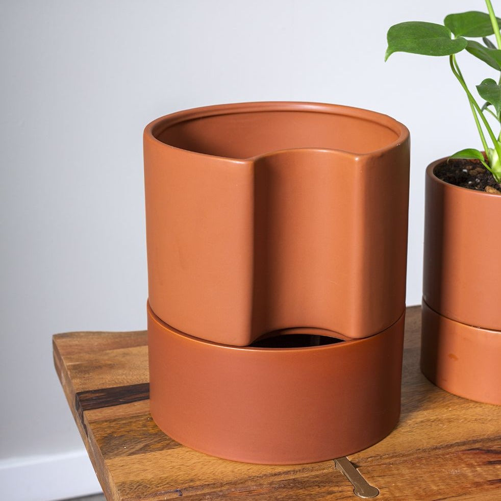 https://peaceloveandhappiness.club/cdn/shop/products/planters-jett-planter-8-terracotta-1.jpg?v=1680751143